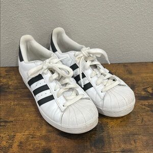 Adidas women’s White and Black superstar
